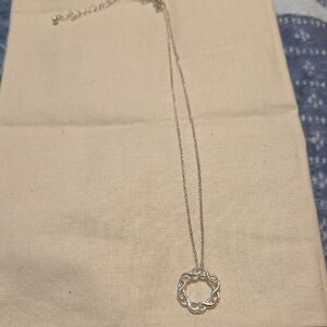 Elegant Silver Ne,cklace with Circular Infiniti Pendant